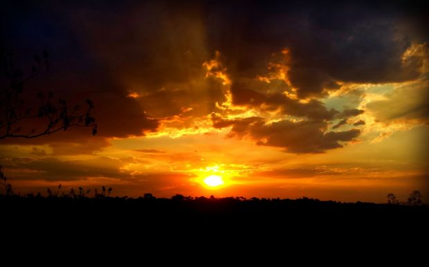 The interplay of the rays of the sun with the clouds and colors makes for an eye catching and wondrous sight.  The interplay of the sun's rays with the clouds and colors makes for an eye catching and wondrous sight.